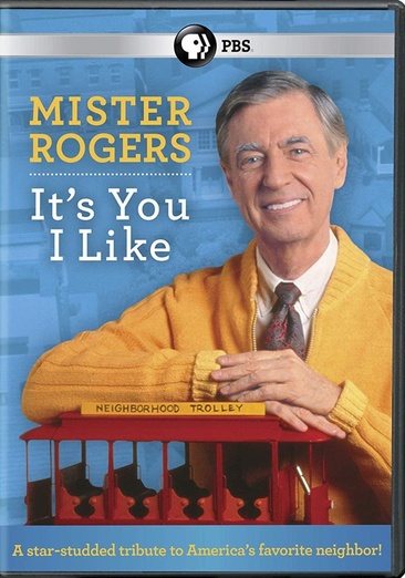 Mr. Rogers wearing an orange cardigan