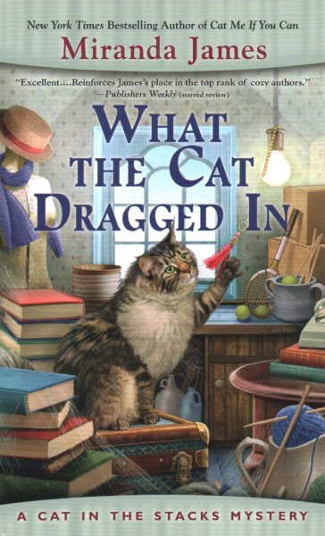 What the Cat Dragged In (Cat in the Stacks Mystery)