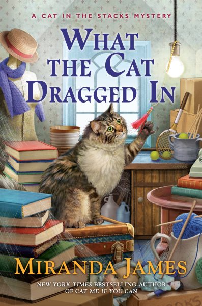 What the Cat Dragged In (Cat in the Stacks Mystery) cover